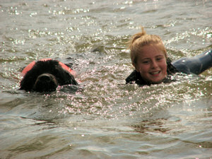 Rosie swimming with Alfie