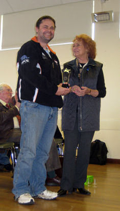 Steve Walker receiving trophy